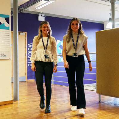People walking in an office setting